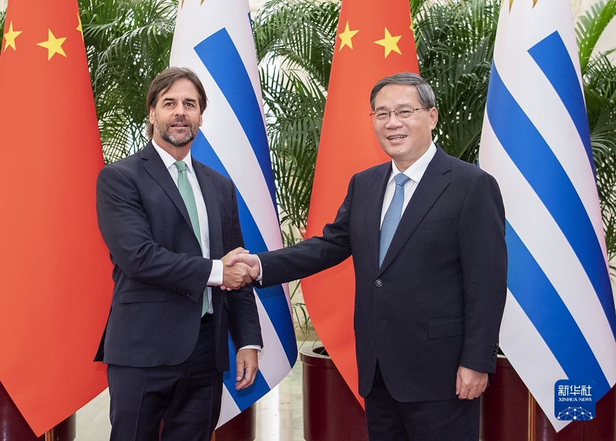 李強會見烏拉圭總統拉卡列